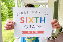 Load image into Gallery viewer, Child holding a sign for the 'First Day of Sixth Grade' 2025-2026 on a porch.