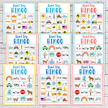 Load image into Gallery viewer, colorful road trip bingo printables on white wood background