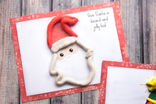Load image into Gallery viewer, play doh santa clause printable mat on wood background