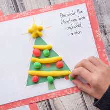 Load image into Gallery viewer, child&#39;s hand decorating play doh christmas tree
