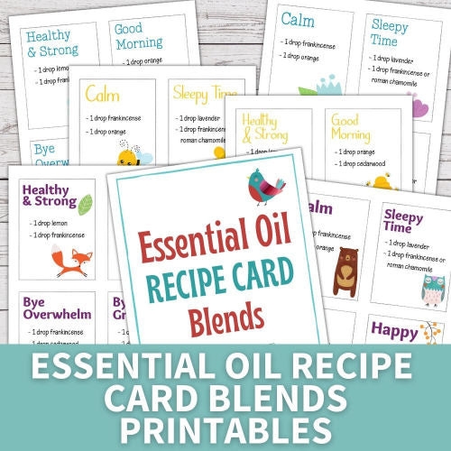 layout of printable essential oil recipe cards on white wood background