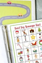 Load image into Gallery viewer, Road trip scavenger hunt holiday themed page in white binder with green road travel page