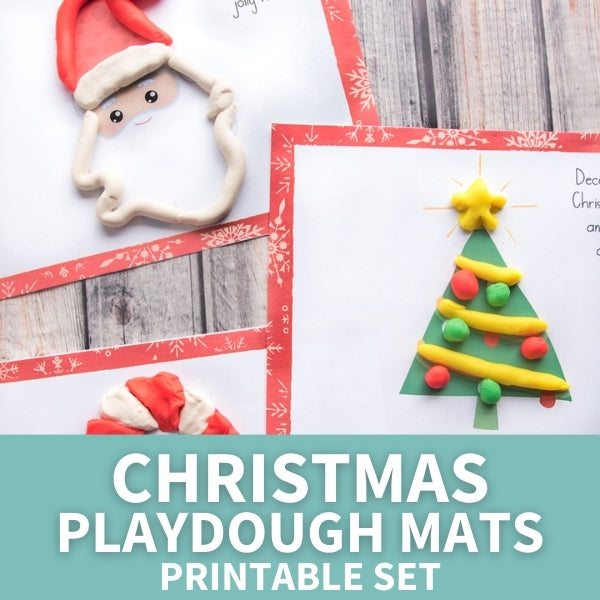 play dough on Christmas playdoh mat set printables on wood background