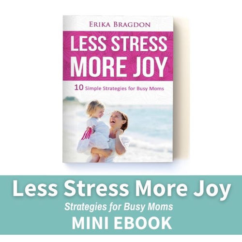 book on white table less stress more joy strategies for busy moms