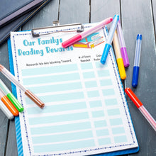 Load image into Gallery viewer, our family&#39;s reading rewards printable chart on blue clipboard with markers
