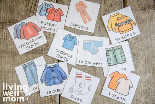 layout of colorful labels with kids clothes on wood background