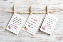 Load image into Gallery viewer, positive affirmations for moms hanging from clothespins on wood background
